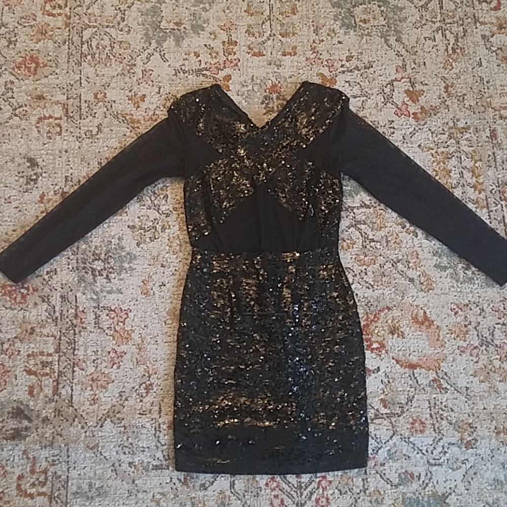 Black cocktail sequence dress.